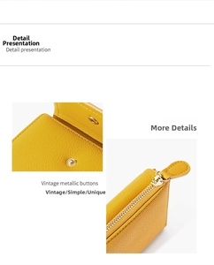 Detail of yellow lychee grain leather wallet with metal snap and durable gold zipper