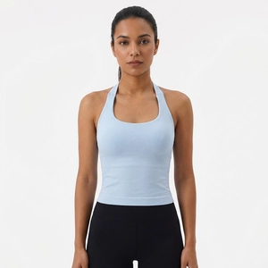 Light blue halter neck sports bra with seamless knit fabric for yoga and fitness