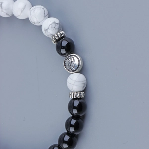 Yin Yang beaded bracelet with white turquoise, black stones and silver metal accents