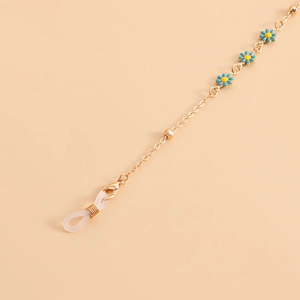 Detail of light gold glasses chain with blue and yellow oil-drop flower pendants
