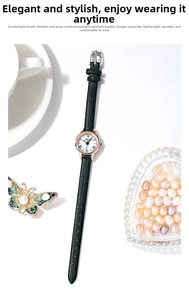 Elegant women quartz watch with black leather strap and gold Roman numeral dial detail
