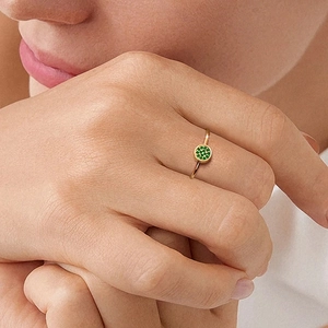 Elegant gold stainless steel ring with a round pavé-set green emerald stone centerpiece