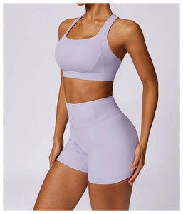 Detail view of lavender yoga set showing seamless stitching and high-elastic fabric