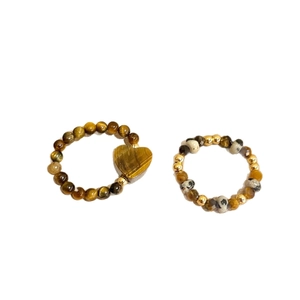 Beaded tiger eye stone rings with heart pendant and elastic band in golden finish