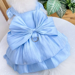 Detail of blue pet wedding dress with large bow and metal D-ring for leash attachment