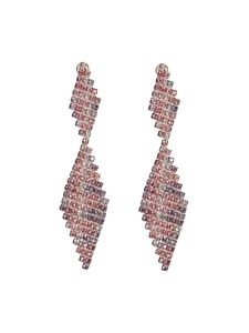 Detailed macro view of pink and purple gradient rhinestone long geometric tassel earrings