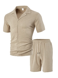 Detail of men's beige ribbed short sleeve shirt and shorts set with fine texture
