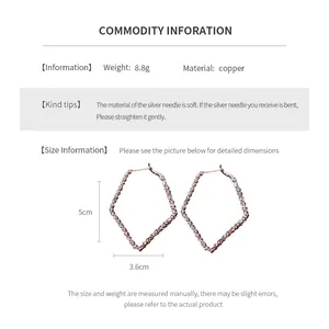 Detailed size chart for geometric diamond earrings showing 5cm height and copper material