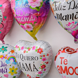Spanish Mother's Day heart-shaped foil balloon with colorful floral prints and Feliz Día Mamá