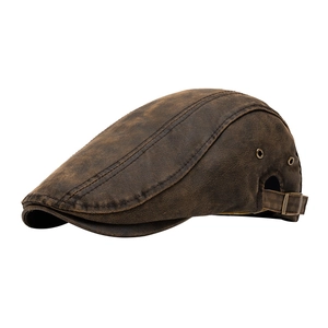 Béret rétro en similicuir marron avec œillets métalliques et boucle réglable à l'arrière