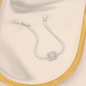 Detailed macro of tennis chain bracelet with white cubic zirconia and rectangle cluster