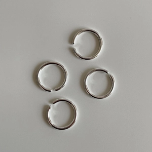 Set of four minimalist S925 sterling silver open rings with polished metallic finish