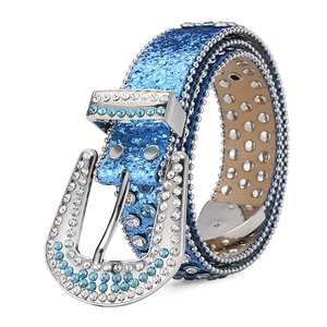 Detailed view of blue glitter Y2K belt with sparkling rhinestones and silver punk studs