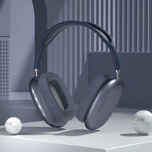Deep blue wireless over-ear headphones featuring fabric mesh ear pads on a modern 3D display
