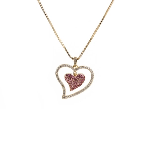 Detail of gold box chain and double heart pendant with pink and white crystals