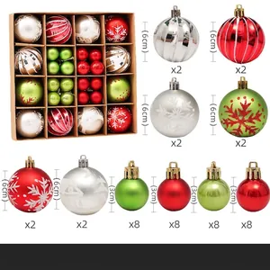 Detail of 44pcs Christmas ball set with snowflake patterns in red green and silver