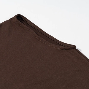 Detailed view of neckline stitching on dark brown satin patchwork commute dress