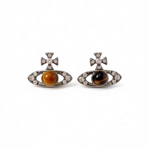 Boucles d'oreilles Saturne de luxe avec œil de tigre et détails en zircon brillant