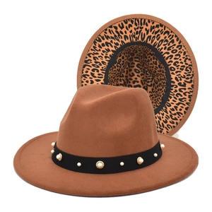 Detail of brown wool fedora featuring pearl studs trim and leopard print lining