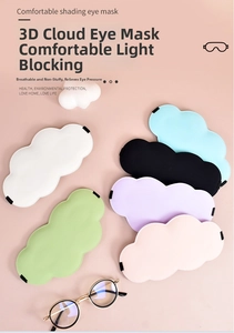 Flat lay of colorful 3D cloud-shaped sleep masks in soft breathable silk fabrics
