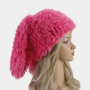 Pink plush rabbit ear trapper hat for women with soft faux fur for winter warmth