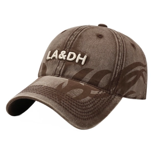Vintage washed brown baseball cap with LA&DH embroidery and tribal prints on brim