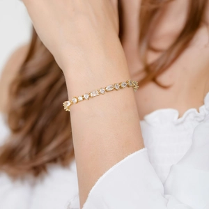 Elegant gold plated S925 sterling silver tennis bracelet with assorted clear zircon stones