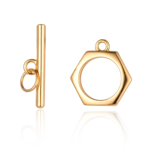 Détail d'un fermoir à bascule hexagonal doré pour accessoires de fabrication de bijoux