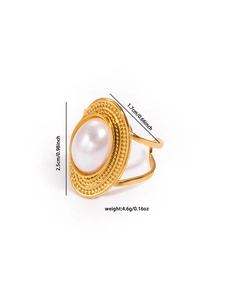 Detail shot of vintage titanium steel ring with large oval pearl and textured edges