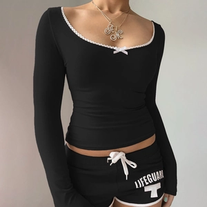Slim fit black long sleeve top with white lace square collar and chic bow detail