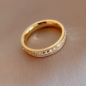 Minimalist gold titanium steel ring featuring a full row of sparkling square zircon stones