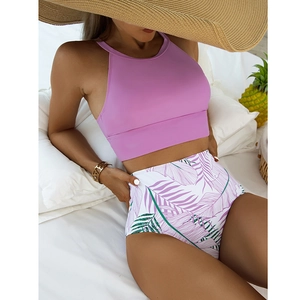 Two-piece lavender halter bikini set with high-waisted tropical palm leaf print bottoms