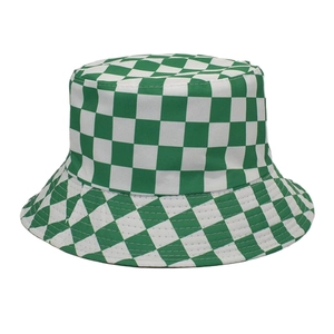 Detail of green and white checkerboard bucket hat showing cotton canvas texture