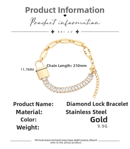 Detail showing gold stainless steel chain bracelet with crystal lock pendant and dimensions