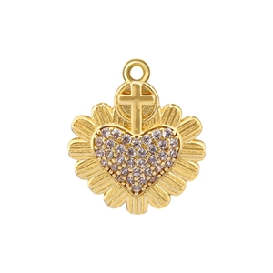 Detailed view of a gold-plated heart and cross pendant with small inlaid clear diamonds