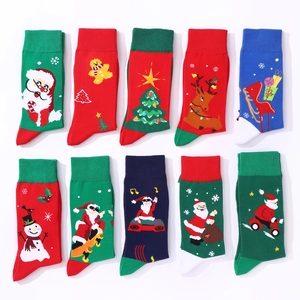 Set of ten colorful Christmas cotton socks with festive patterns like Santa and reindeer