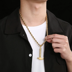 Hip hop gold hammer pendant necklace with twist chain shown on male model