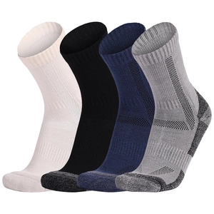 Thick merino wool hiking socks set for winter sports in beige, black, navy, and grey