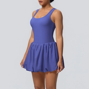 Detail of purple pleated tennis dress with wide shoulder straps and built-in shorts