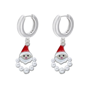 Detailed shot of Santa Claus earrings with red enamel hats and white pearl beards
