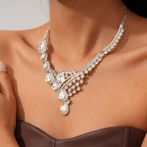 Detail of luxury teardrop diamond necklace with intricate rhinestone patterns and shimmer