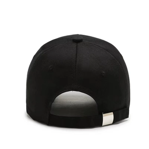 Rear view of black baseball cap showing the adjustable silver metal buckle strap