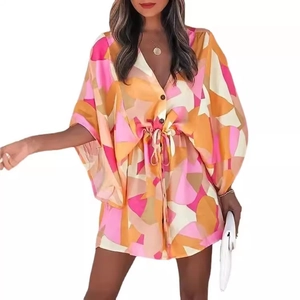 Women's V-neck geometric print dress with ruffle sleeves and drawstring waist on white background