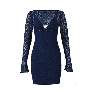 Detail of navy lace two-piece dress featuring sheer floral patterns and slim silhouette