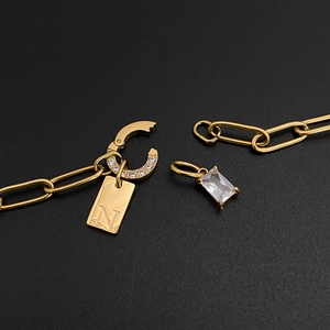 Elegant gold-plated titanium steel necklace with letter N tag and clear crystal pendant