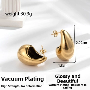 Detailed view of hollow chunky C-shaped gold earrings with weight and size specifications
