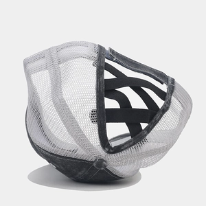 Close-up of ponytail baseball cap featuring breathable mesh and elastic criss-cross bands