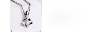 Size chart showing 49mm length and 33mm width for the vintage skull anchor pendant