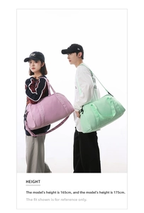 Detailed view of large capacity sports duffel bags carried by male and female models
