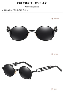Detail view of round steampunk sunglasses with unique black metal hollow chain frame design